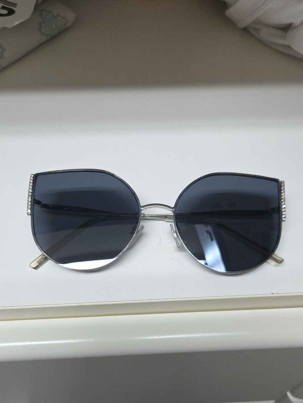 Steve Madden Silver Frame Sunglasses with Dark Blue Lenses